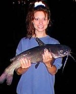 Tom's sister Heather, with her first catfish.